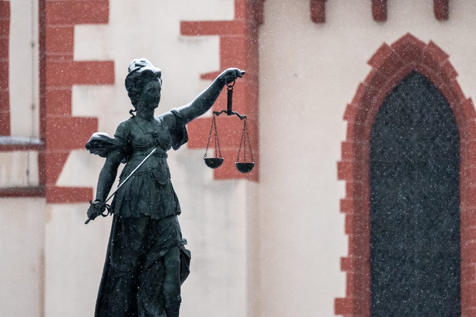 Lady Justice statue in urban area